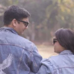 couple with diy art on denim jacket with artistic butterfly and eagle